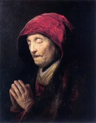 Alte Frau beim Beten